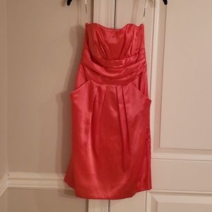 Coral sateen bridesmaid dress by DAVID'S BRIDAL